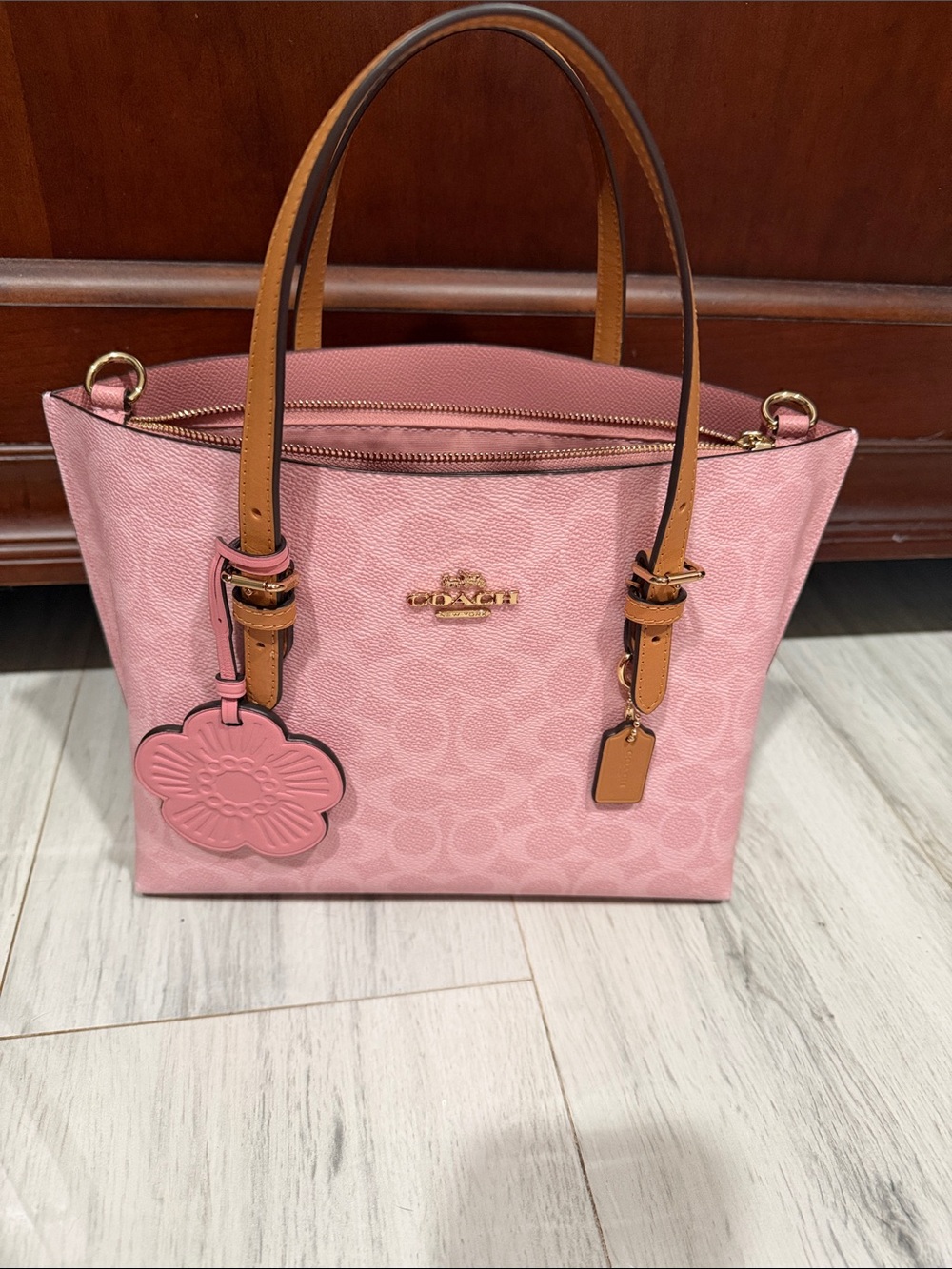 Coach Pink Signature Tote with Tan Leather Handles and Floral Charm